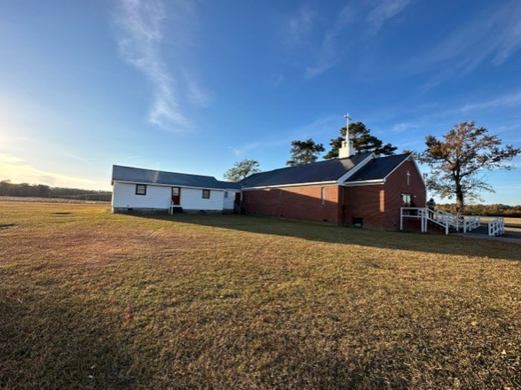 a modern home with a gray metal roof